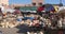 MARRAKESH, MOROCCO- JUNE, 11, 2019: outdoor market stalls selling baskets, hats and other woven goods at marrakesh