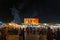 Marrakesh, Morocco,Okt 4,2018:People at night at food stands Jemaa el Fna Square. Square is UNESCO World Heritage.Big poster king