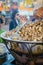 Marrakesh, Morocco - September 05 2013: Boiled snails cooked in large pot and sold as snack on Jamaa el Fna square