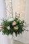 Marriage flower arrangement on stand on floor for wedding