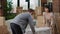 Married couple decorating apartment with furniture to move in