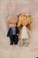 Married couple dolls on a light fabric background