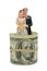 Married Couple Figurine inside Dollar Bill Roll
