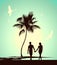 Married couple walking on tropical island