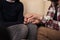 Married people holding hands at couple therapy session