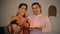 Married village couple happily celebrating Diwali festival together at home