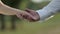 Marry Me Today And Everyday. Newlywed Couple Holding Hands, Shot In Slow Motion.