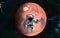 Mars. Astronaut in front of the red planet of the solar system. Science fiction