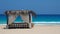 Marsa Matruh, Egypt. Elegant gazebo on the beach. Amazing sea with tropical blue, turquoise and green colors. Relaxing context
