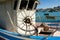 Marsaxlokk, Malta, August 2019. Closeup of the steering gear of a traditional Maltese boat in a harbor.