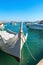 Marsaxlokk, Malta, August 2019. Gorgeous white pleasure boat on the background of the harbor.