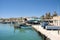 Marsaxlokk, Malta, August 2019. Morning view of the embankment of a small seaside town.