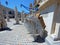 Marsaxlokk, Malta, August 2019. Stacked chairs of a street cafe in the early morning on a town square.