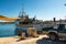 Marsaxlokk, Malta, August 2019. View of the working berth for ships on a hot summer day.