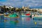 MARSAXLOKK, MALTA - Jan 10, 2017: A landscape shot of the traditional fishing village of Marsaxlokk in Malta, with colorful boats