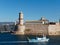 Marseille, fishing boat entering the harbor, France