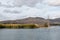 Marsh Grass in Lake with Background of Mountains