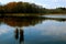 Marsh waters reflecting sky and fall colors