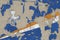 Marshall Islands flag depicted in paint colors on old obsolete messy concrete wall closeup. Textured banner on rough background