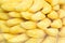 Marshmallow Bananas candies pile yellow background