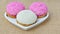 Marshmallow biscuits with pink sugar sprinkles and shredded coconut