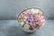 marshmallow bouquet of flowers in a basket on a light background