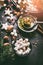 Marshmallow and Christmas star cookies with chocolate and spices: cinnamon, anise and cardamon with nuts on dark background