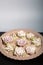 Marshmallow flowers on a tray. Marshmallow flower buds. Homemade sweets