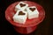 Marshmallows with Cocoa Dusted Hearts on Red Plate