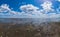 Marshy sea shore. coastline panorama. coast with silt. seascape with horizon line. sky with clouds