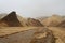 Marsian landscape: yellow and orange rocks during the sand storm