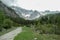 Marstein - A gravelled road through Alpine valley in Austria in the region of Dachstein. High mountain around