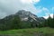 Marstein - View on the Alpine peaks in Austria from the Marstein, with a wooden cross on the top