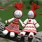 Martenitsa, white and red strains of yarn, Bulgarian folklore tradition in spring. Two dolls woman. Baba Marta Day on