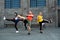 Martial art fitness coach teaching his students frontal leg kicks