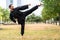 Martial artist practicing Qigong in office break