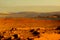 Martian Landscape with rocks and red soil with mountains in the background generated by ai