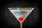 Martini cocktail with maraschino cherry