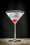 Martini cocktail with maraschino cherry