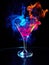 martini glass with colorful alcohol and smoke on black background, burning cocktail with neon glow, generative AI