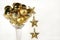Martini glass of golden christmas ornaments