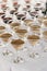 Martini rows on table at wedding reception. Cocktails and red and white martini in glasses at alcohol bar at wedding or christmas