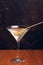 Martini on rustic background with space for text. Vertical shot