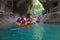 MARTVILI, GEORGIA - SEPTEMBER 9, 2017: A group of tourists floating in a boat on the river Martvili canyon