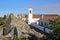 MARVAO, PORTUGAL: Santiago Church with the castle in the background