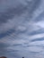 A marvellous snapshot of an extreme view of a peculiar pattern of clusters of white clouds