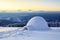 Marvelous huge white snowy hut.