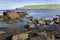 Marwick Bay with remnants of a boiler from a shipwreck