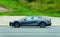 Maryland, U.S - August 16, 2020 - A grey color of Tesla Model S sedan all-electric car speeding on the road