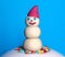 Marzipan snowman on blue background